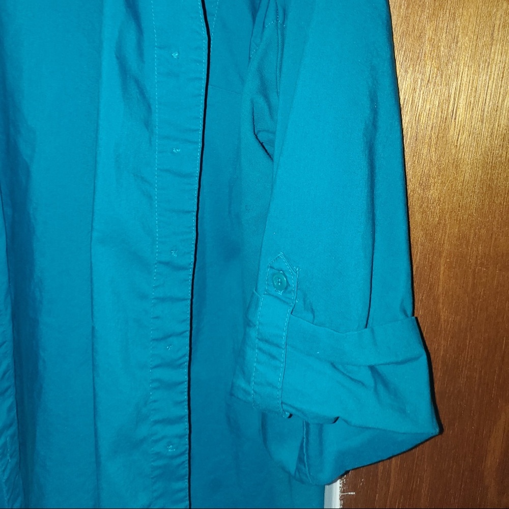 Blouse Turquoise. I’m not sure what brand Cathy is